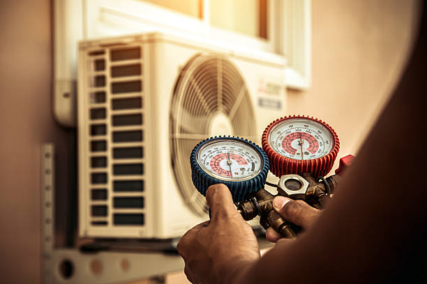 Professional Air Conditioning Service technician working in Waxahachie, TX